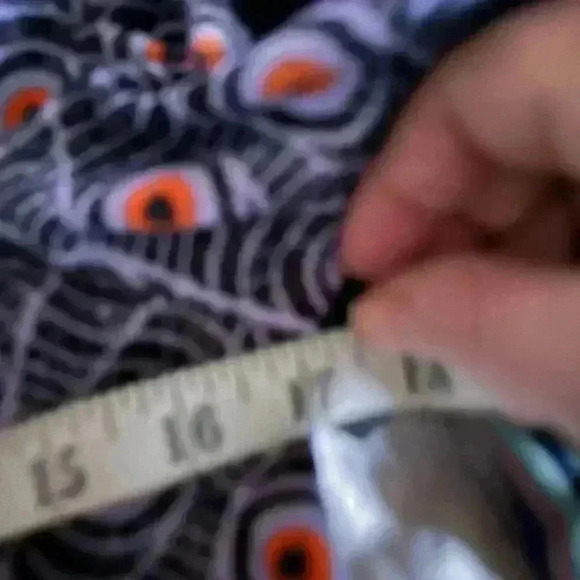 Lularoe small Gigi top . Light blue, orange, black. Legging material. Eyeballs! - Picture 4 of 8